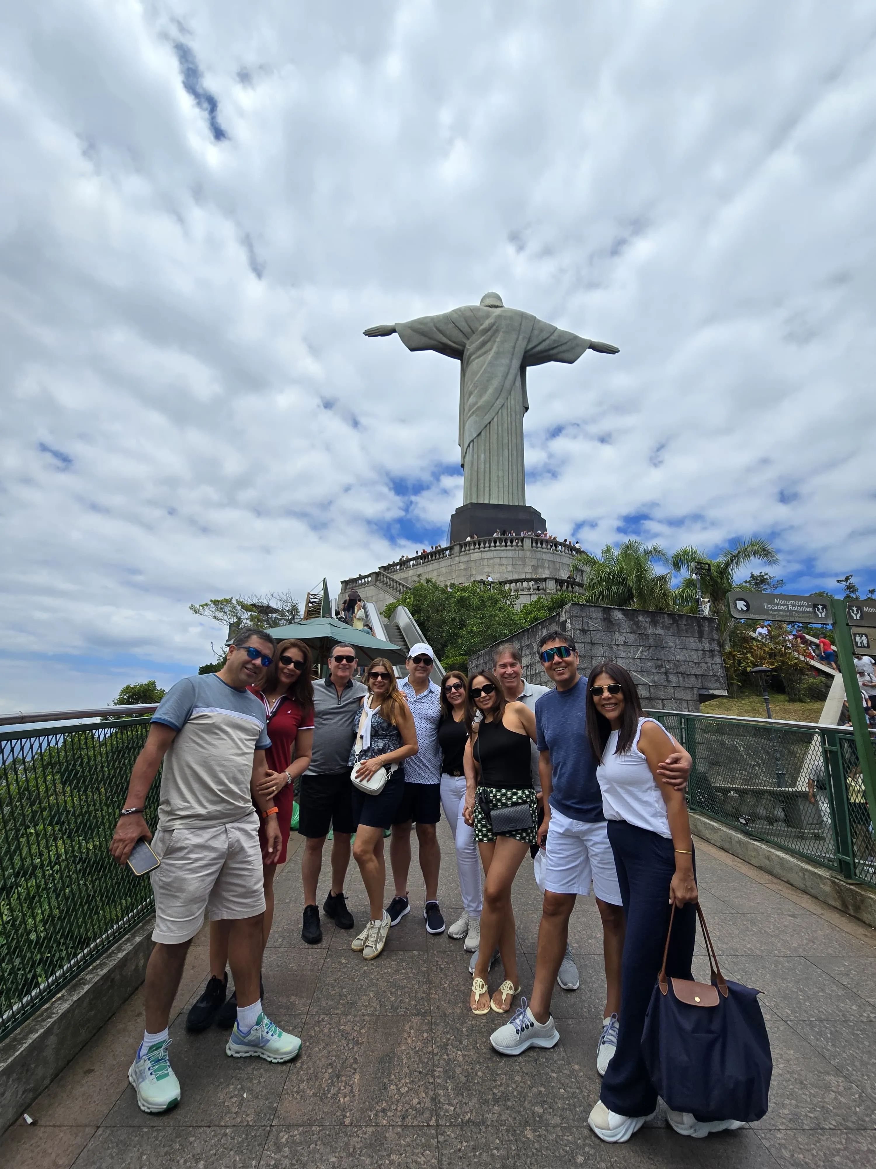 family behind christ the redeemer statue