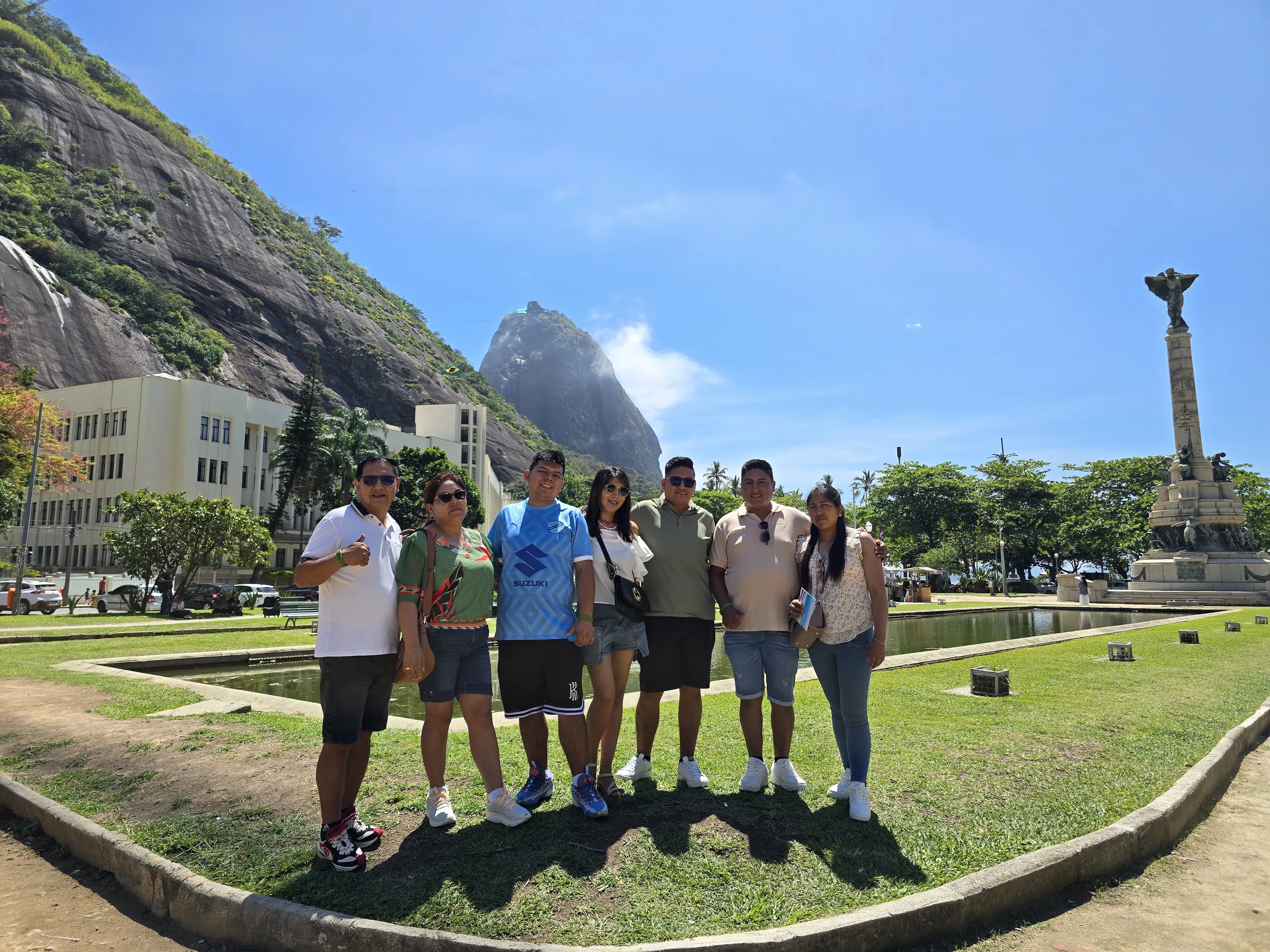 group tour with sugarloaf mountain backdrop